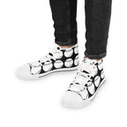 Noir style photography, sneakers under a single street lamp at night, high contrast, dramatic shadows, cinematic atmosphere,