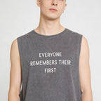 Close-up view of the collar and shoulder seam details of the garment.Stitching details at the collar and sleeve cut.