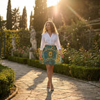 A mosaic skirt in deep green and yellow tones that glows in the dim light.
