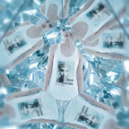 Artistic photography of a model in a room of mirrors, reflecting the 'From Another Future' graphic multiple times. Ethereal, dreamlike atmosphere, soft focus on the edges, icy blue color palette.